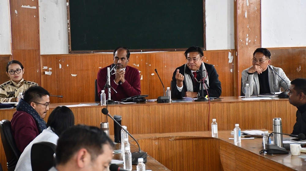 Advisor Mhathung Yanthan addressing the Wokha DPDB meeting held at the Deputy Commissioner’s conference hall on December 8. (DIPR Photo)